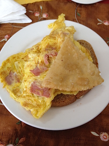 Omelet with sausages and Mongolian pancake