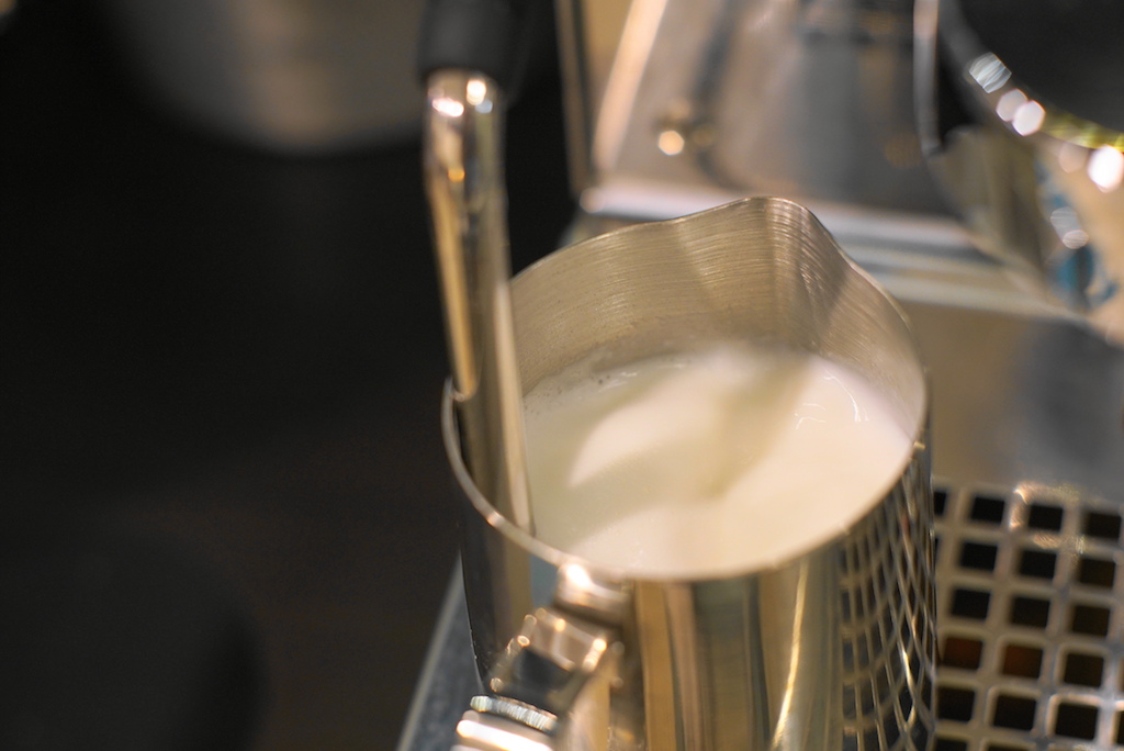 frothing milk for lavender latte